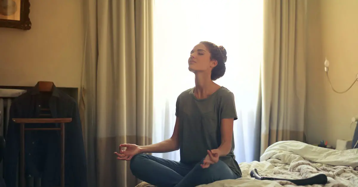 Woman Meditating In Bedroom